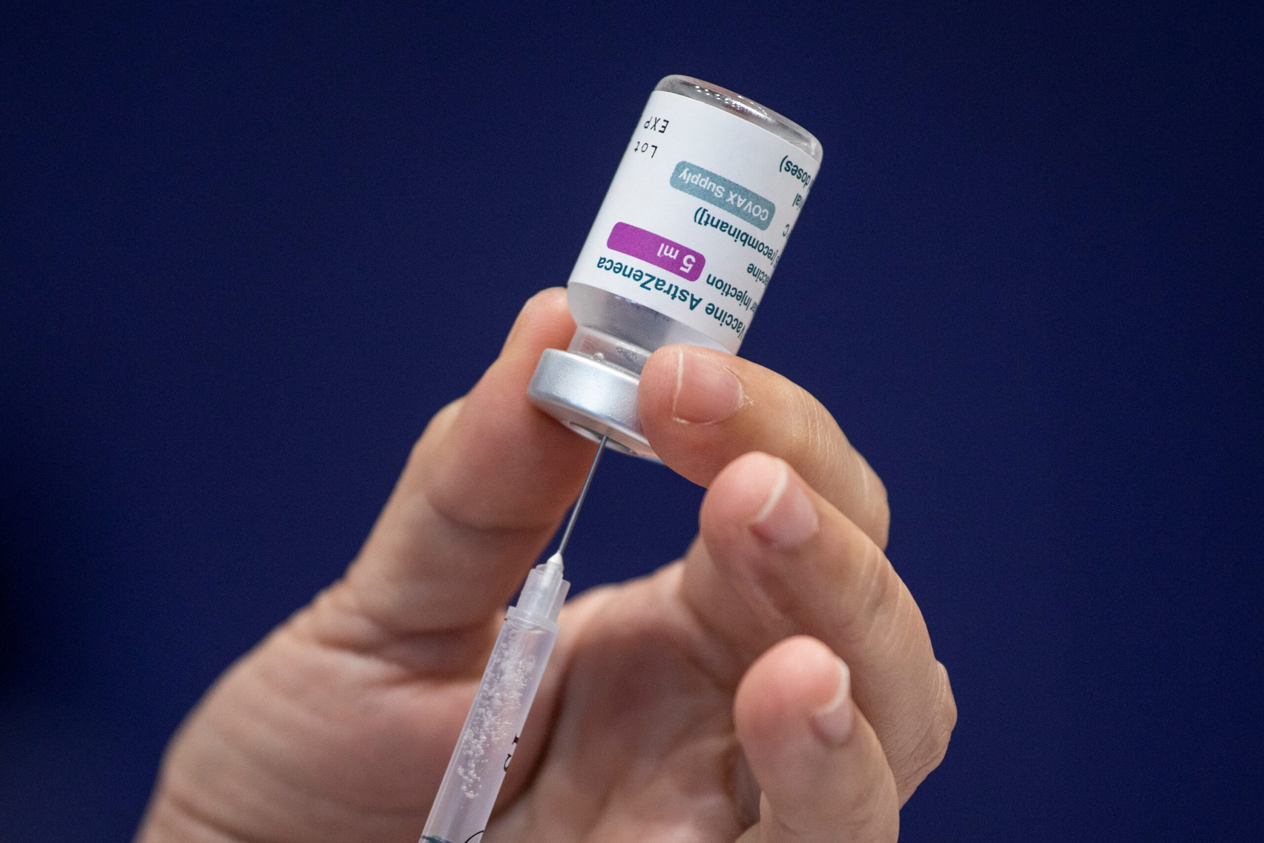 FILE PHOTO: Healthcare workers get COVID-19 vaccine in Metro Manila