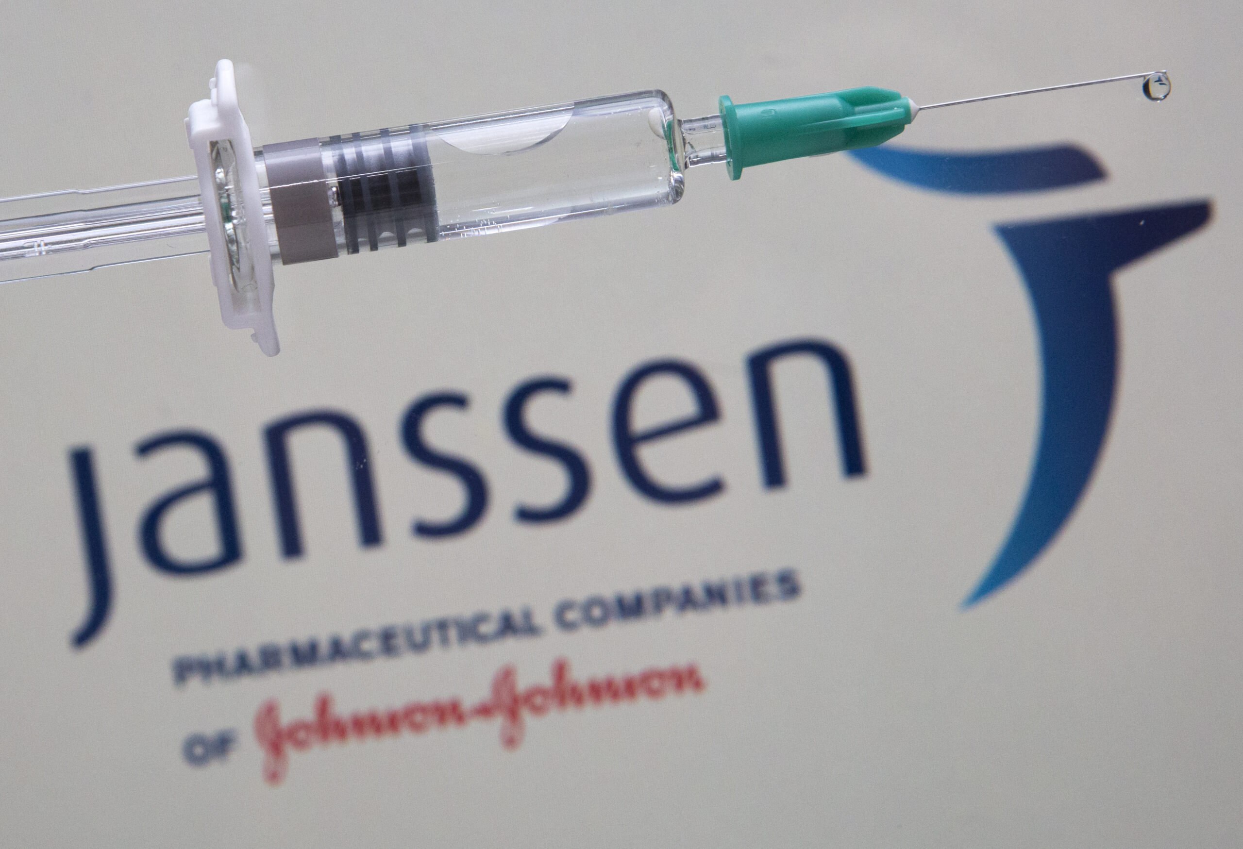Syringe with the logo of the pharmaceutical company Janssen (Johnson & Johnson).