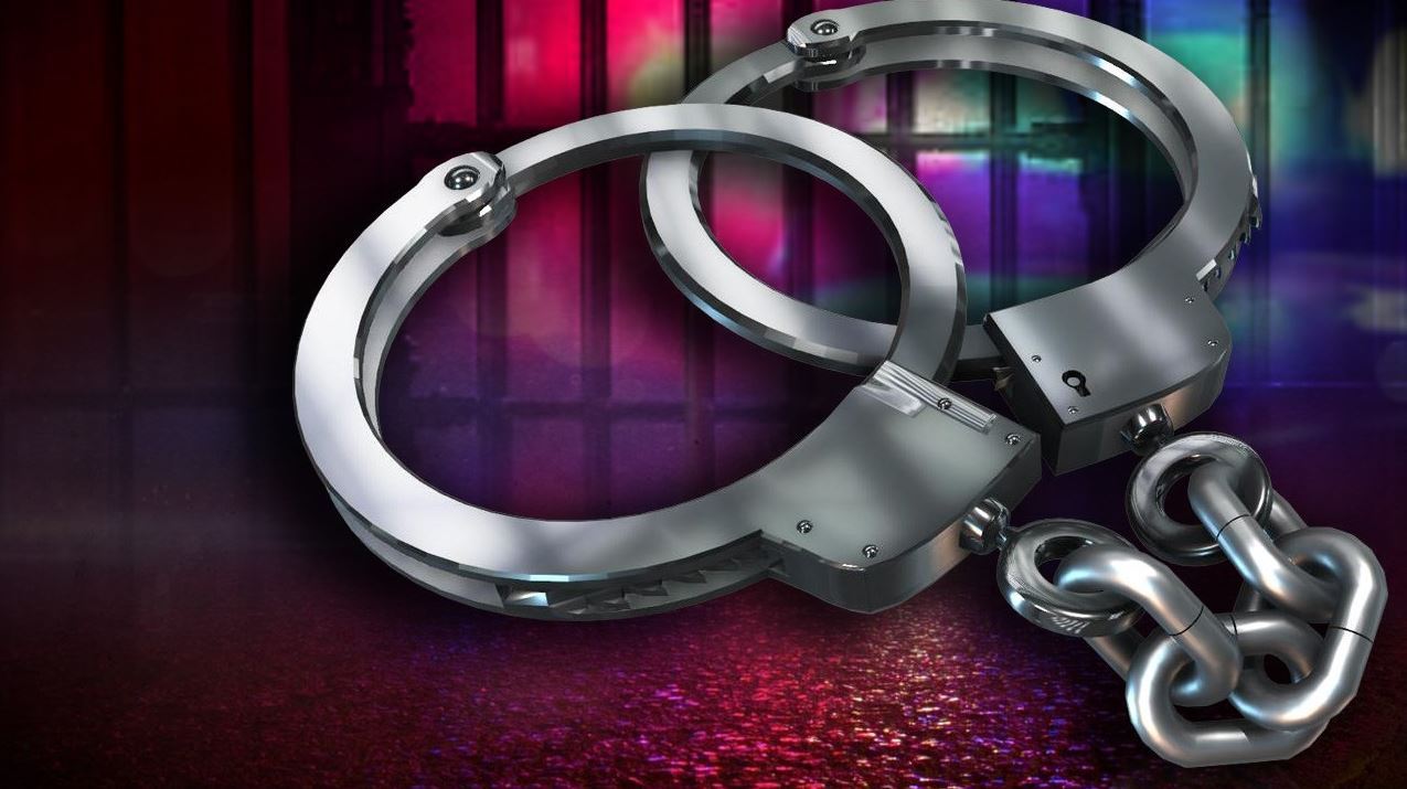 Arrested20art20-20handcuffs20over20jail20cell20reds20and20blues2011-18-15_1520381077382.JPG_36071492_ver1.0