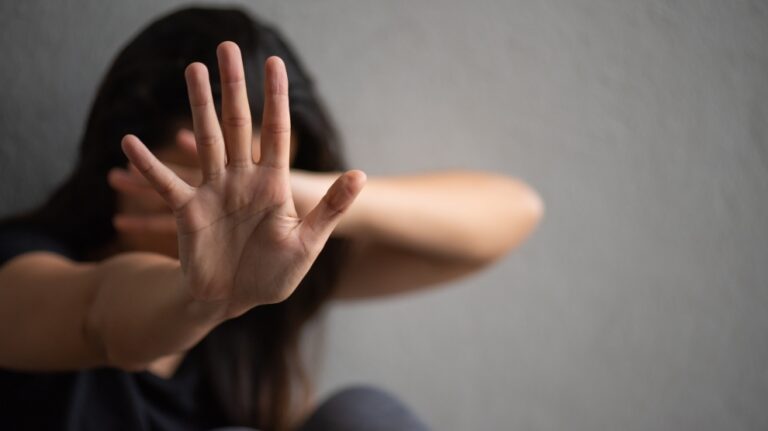 bigstock-woman-hand-sign-for-stop-abusi-249085132-990x556-1